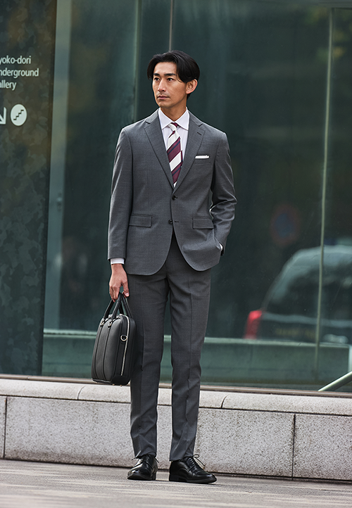 ミディアムグレーの織柄無地セットアップスーツ