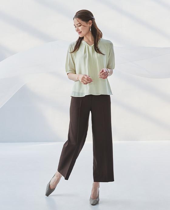 Brown collarless jacket on and off