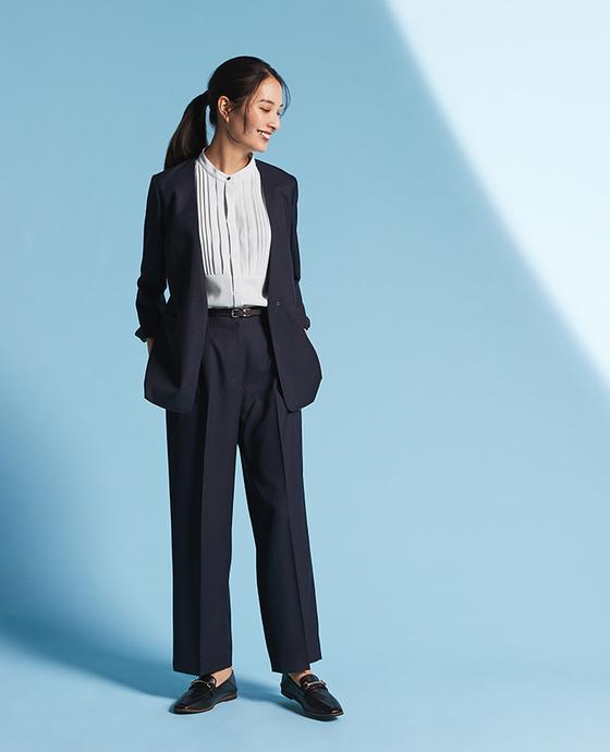 Navy collarless jacket on and off