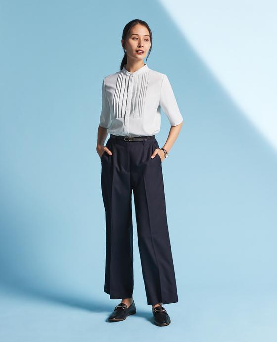 Navy collarless jacket on and off